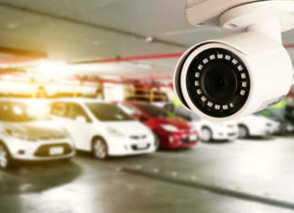 Security CCTV camera in office building installed indoor car park - ph credits: AdobeStock