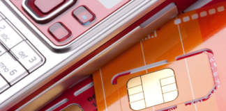 Close-up of mobile phone with sim cards - ph credits: AdobeStock